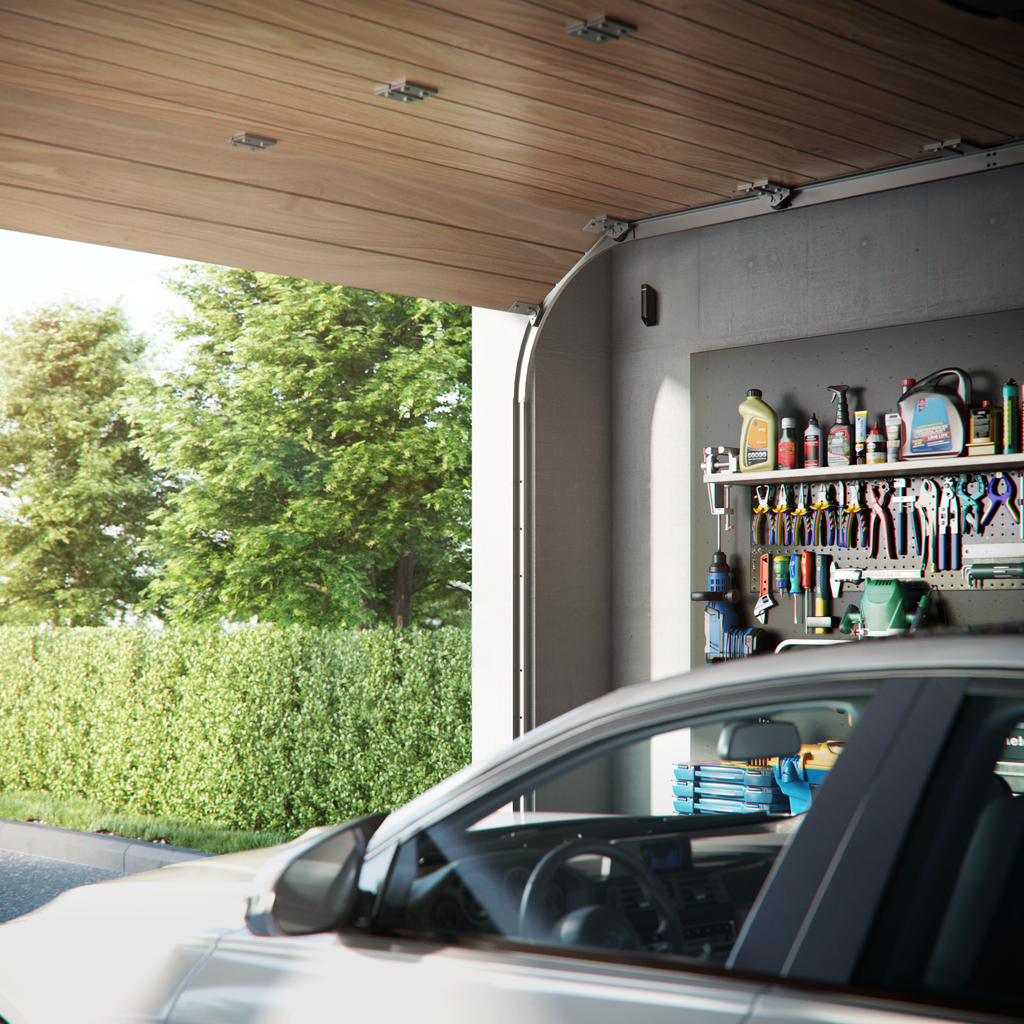 Ajax MotionProtect Curtain motion sensor mounted in a garage